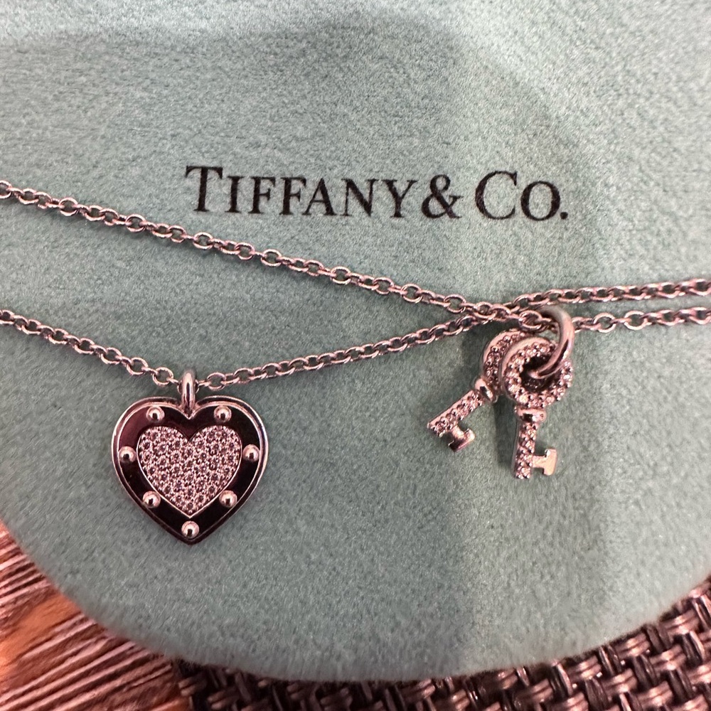 TIFFANY & Co 18k White gold & diamond return to Tiffany double chain bracelet.